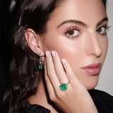 Maria Jose Jewelry Step Cut Drop Emerald and Diamond Earrings on model's right ear