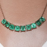 Maria Jose Jewelry 18kt Yellow Gold Emerald Necklace on model detail view of stones