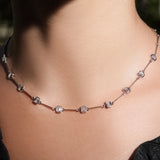 Maria Jose Jewelry Bezel Set Emerald Cut Diamond Necklace on model's neck detail view