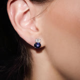 Maria Jose Jewelry Double Oval Diamond and Sapphire Earrings on model's right ear detail view