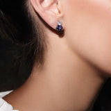 Maria Jose Jewelry Double Oval Diamond and Sapphire Earrings on model's right ear