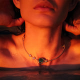 Maria Jose Jewelry Emerald Choker Necklace on model in water with red light