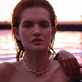 Maria Jose Jewelry Emerald Choker Necklace on model in water