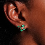 Maria Jose Jewelry Emerald Constellation Earrings on model's right ear