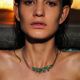 Maria Jose Jewelry Emerald Diamond Necklace on model in water