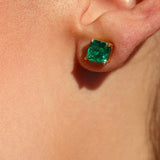 Maria Jose Jewelry Emerald Stud Earrings on model's left ear close up view