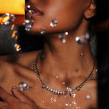 Maria Jose Jewelry Floating Diamond Necklace on model splashing water