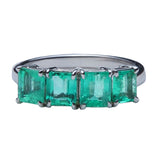 Maria Jose Jewelry Four Stone Emerald Ring closeup view