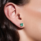 Maria Jose Jewelry White Gold Emerald Stud Earrings on model's right ear detail view