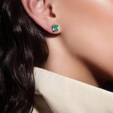 Maria Jose Jewelry White Gold Emerald Stud Earrings on model's right ear