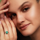 Maria Jose Jewelry Emerald Solitaire Ring on Model Left Hand Detail View